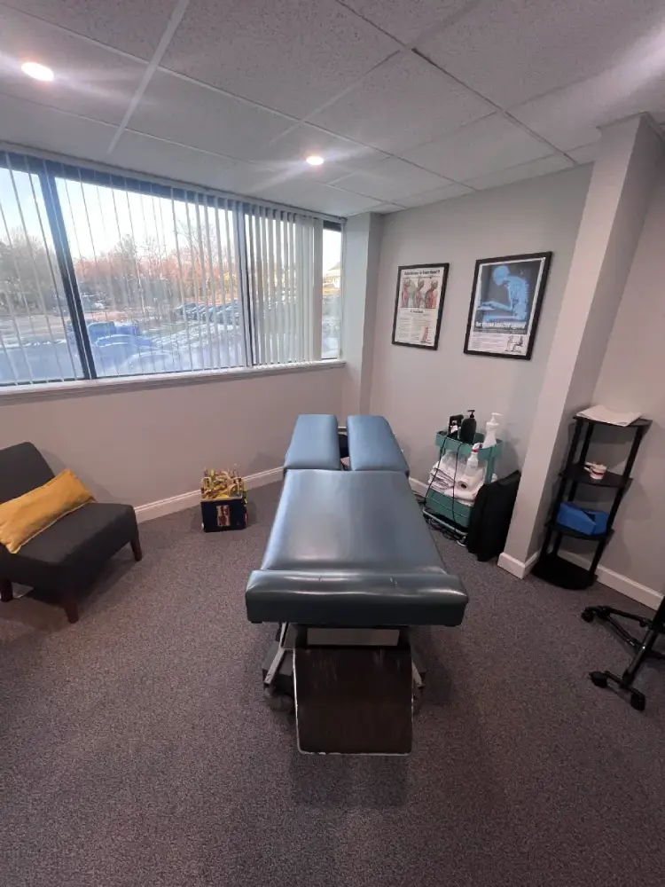 chiropractic table in a the chiropractic and wellness of stamford clinic